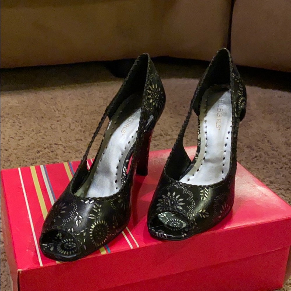 Black with silver trim BCBG peep toe heel.